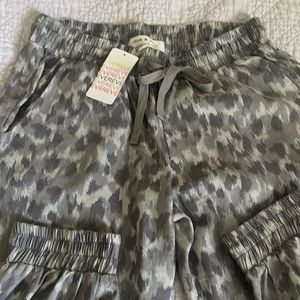 Cloth and stone jogger type pants. Never worn.